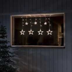 Outlet 👏 Konstsmide 90cm Multi Action Star Curtain Light Warm White LEDs 😍